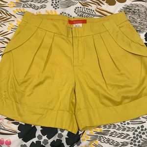 Anthropologie Cartonnier mustard pleated shorts